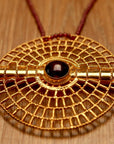 Asante Sundial Garnet Necklace