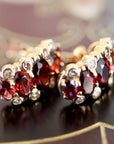 Prince Consort 14k Gold, Garnet and Diamond Earrings.